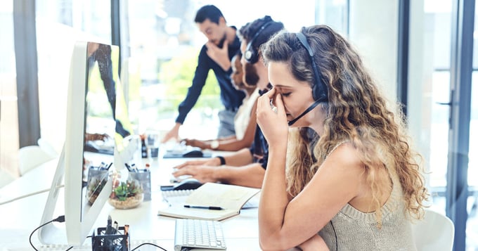 Contact centre staff stressed out at desk