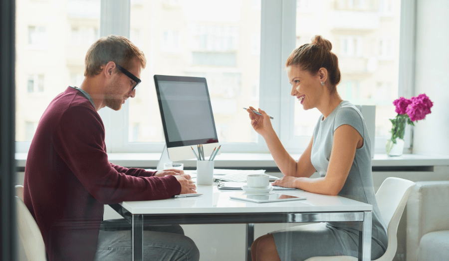 Adviser and client in office