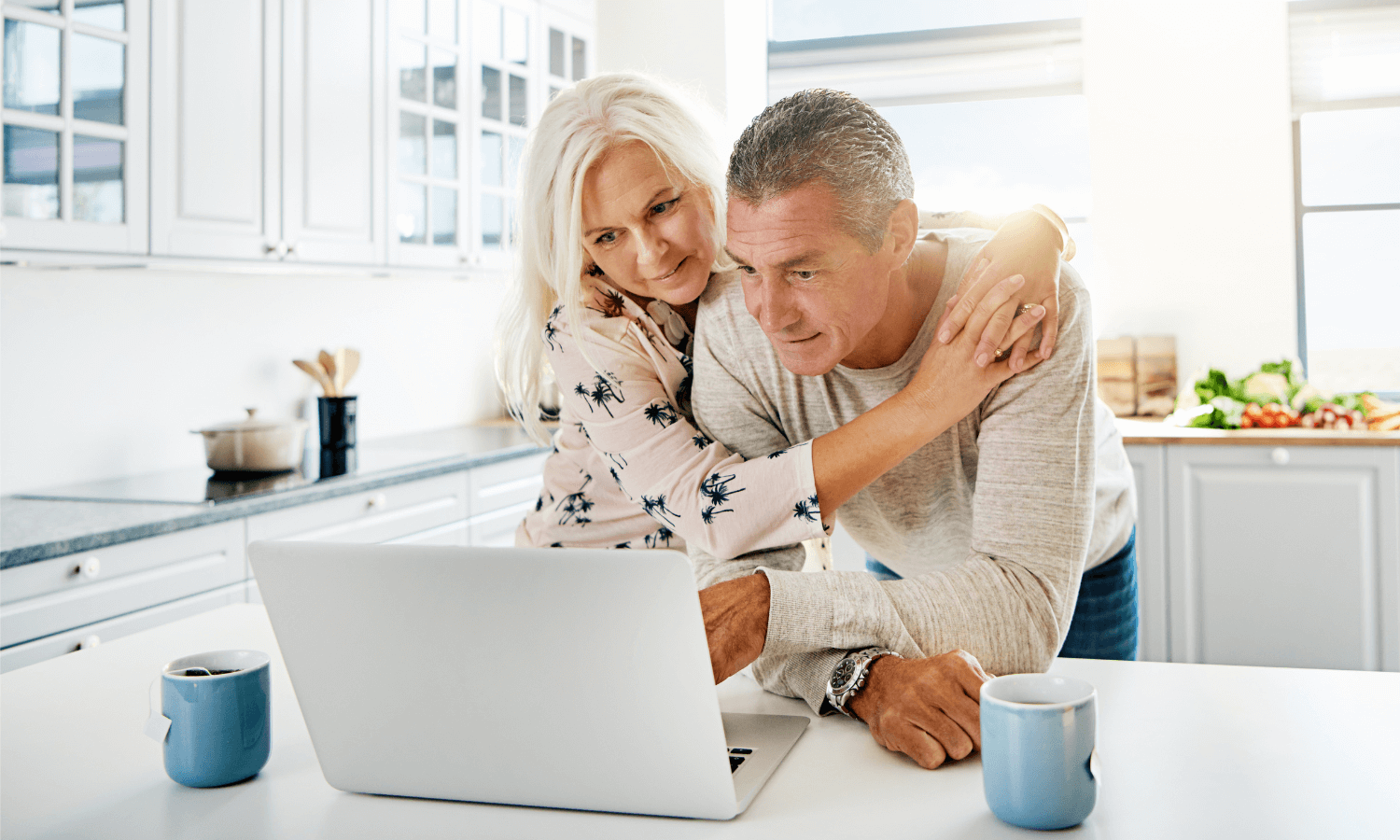 Couple looking at their pensions online-1