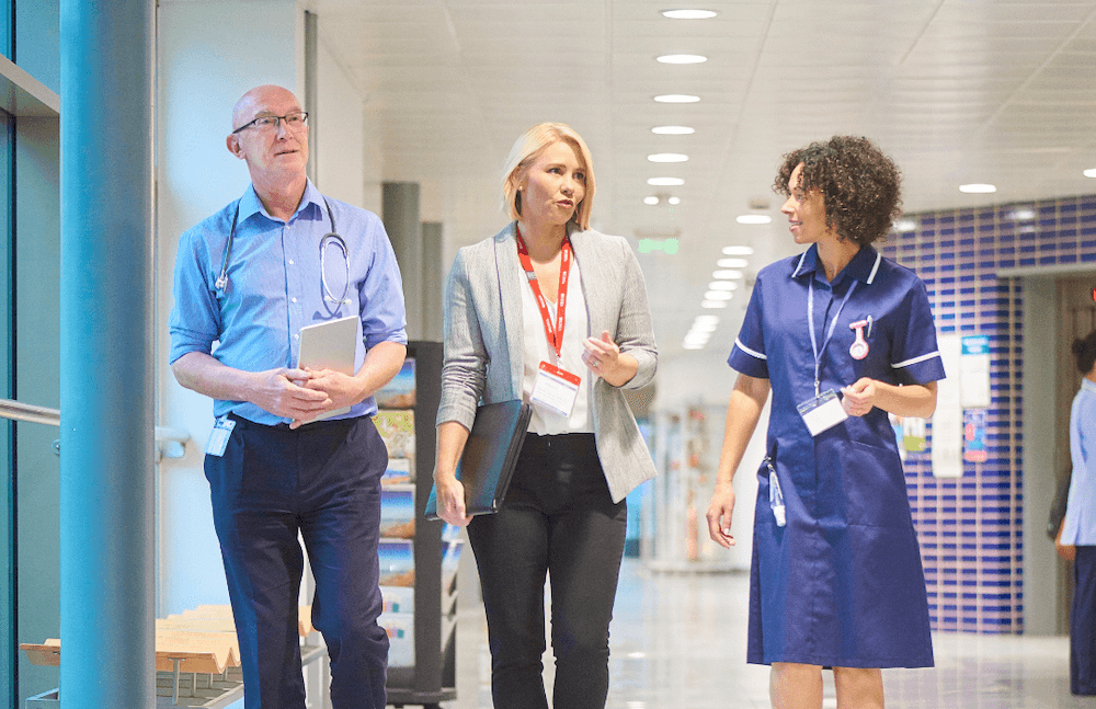 Doctors and nurse in hospital corridor