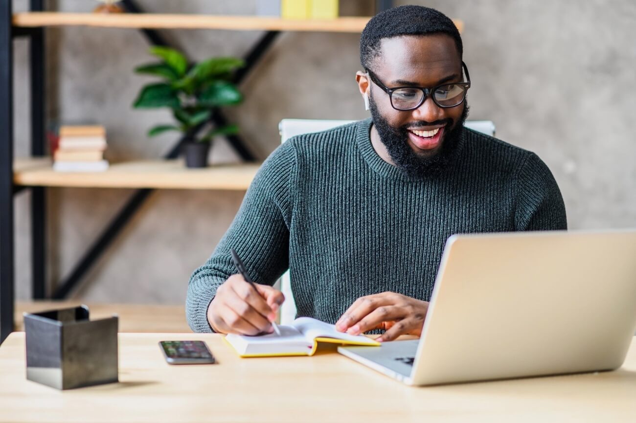 Financial adviser working in office with laptop