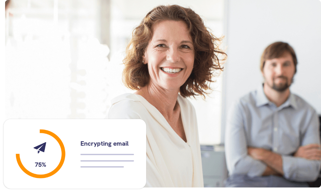 Head of compliance looking at colleagues and smiling in office