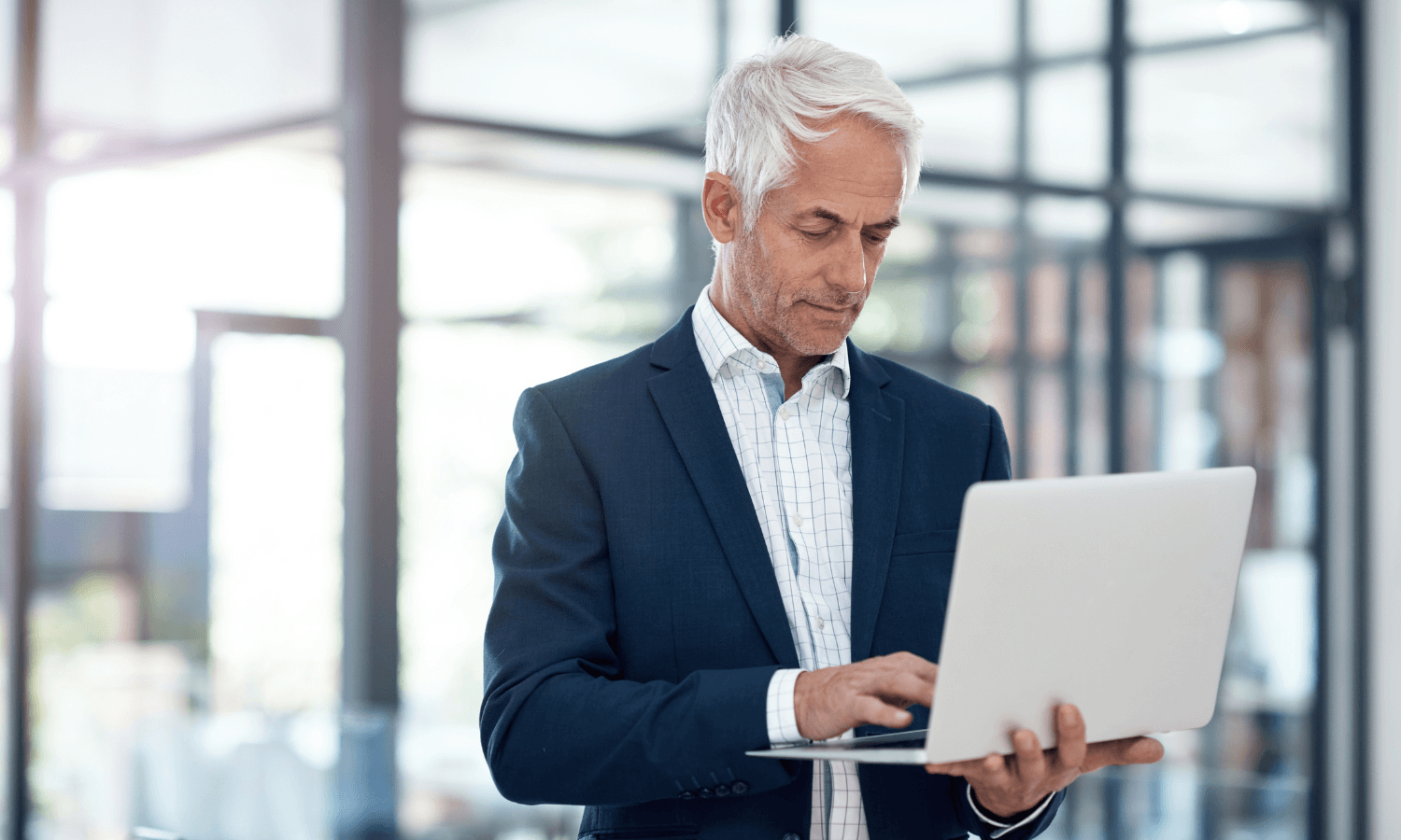 IT manager testing outbound email security using laptop-1