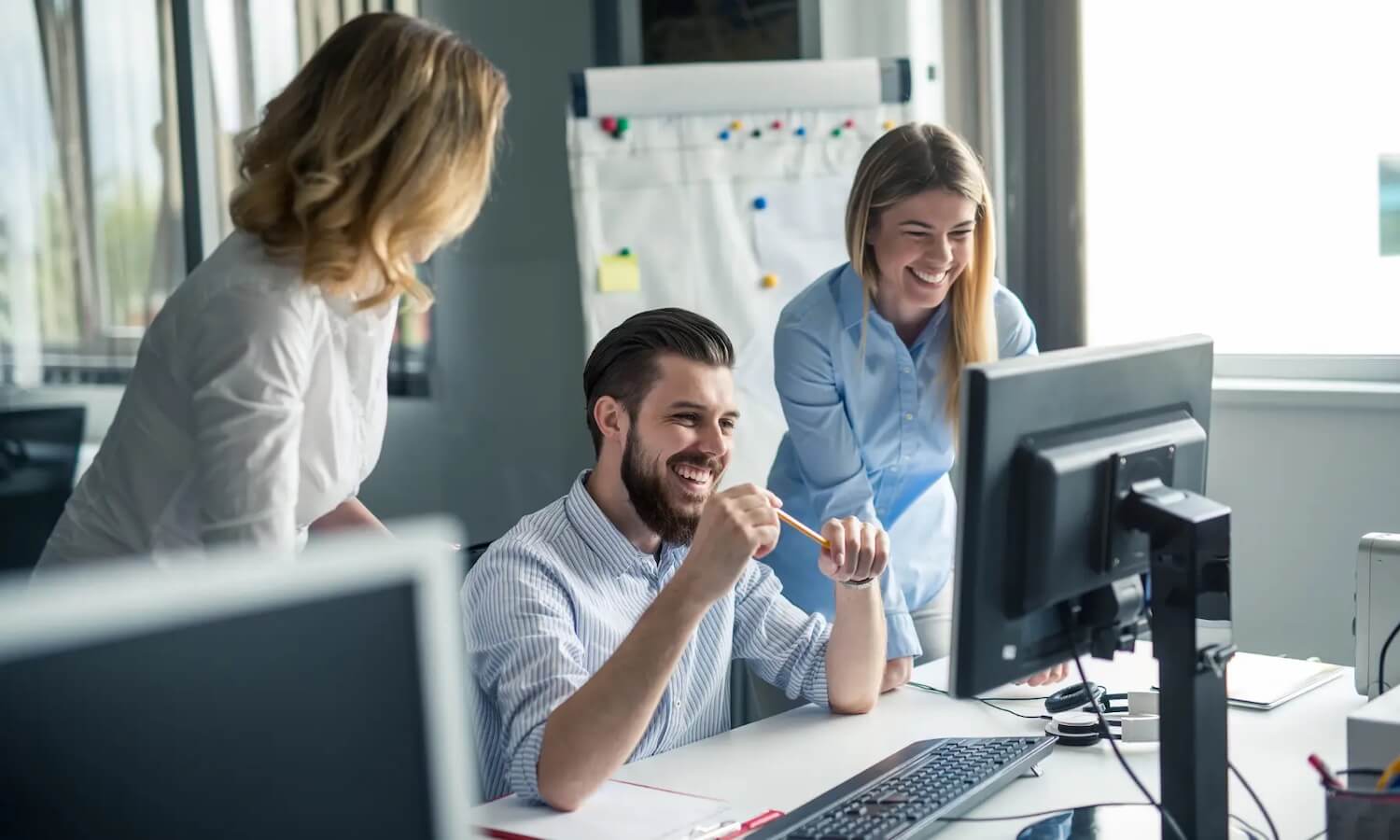 IT team looking at secure email on desktop computer