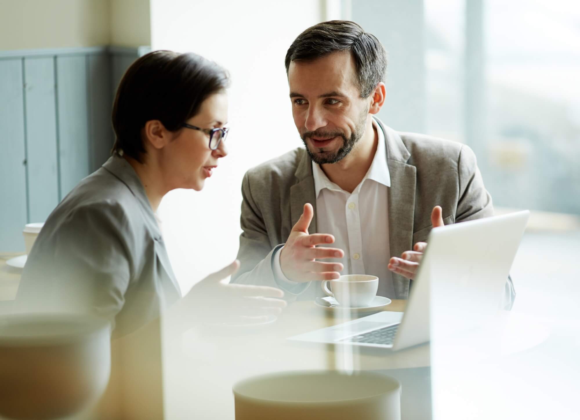 man and woman talking about secure email