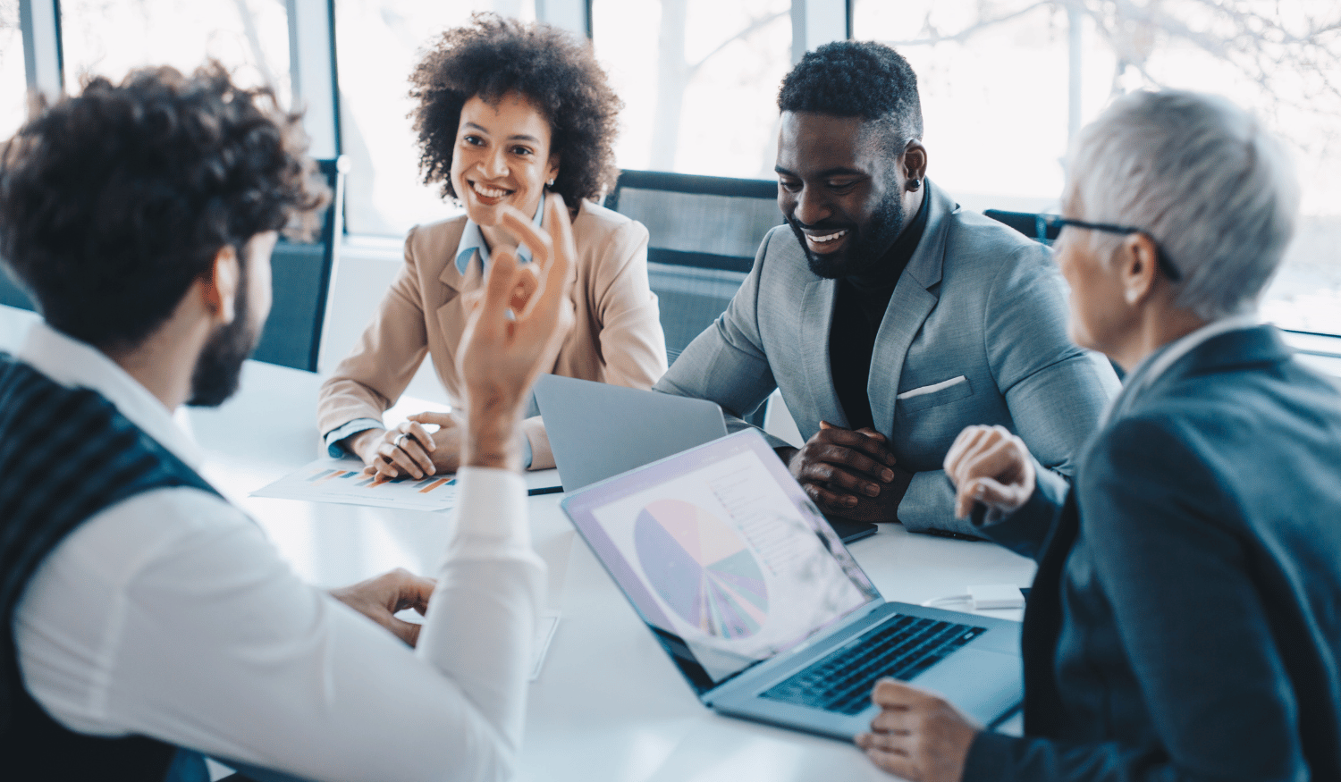 Financial leaders meeting in an office board room