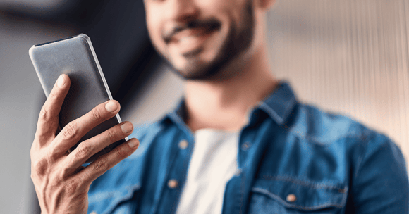 Man using smartphone to receive digital documents