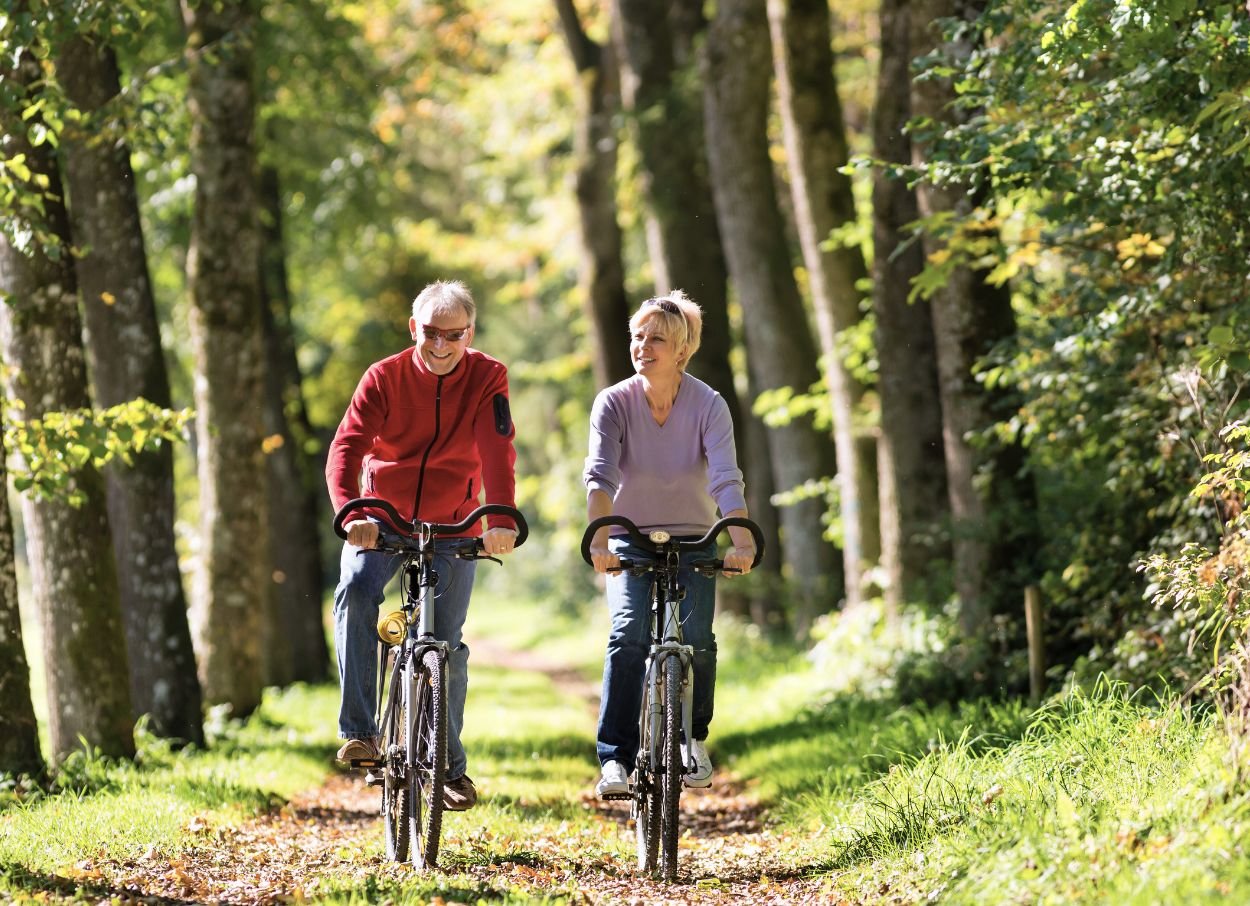 Senior couple riding bikes