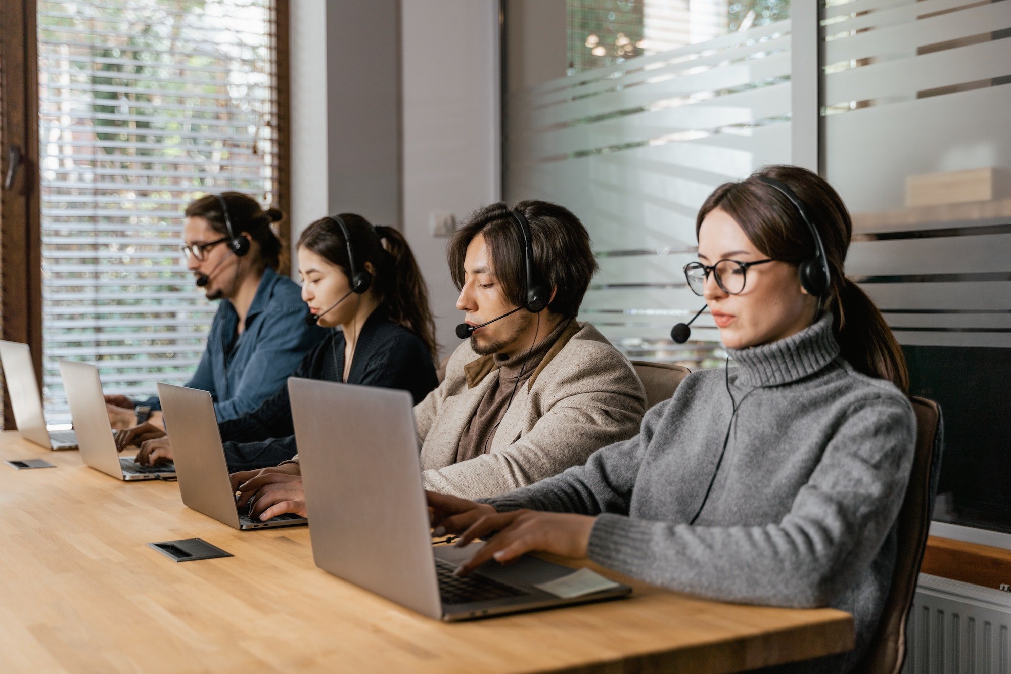 People working at desk together