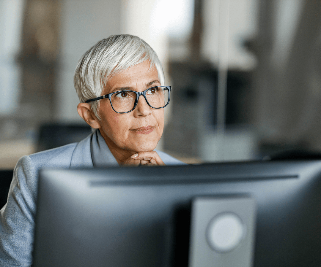 Female financial adviser using computer in office