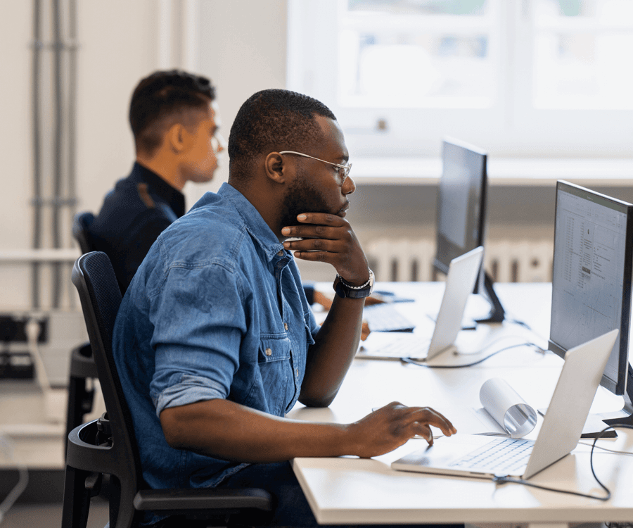 SEG manager in office using secure email
