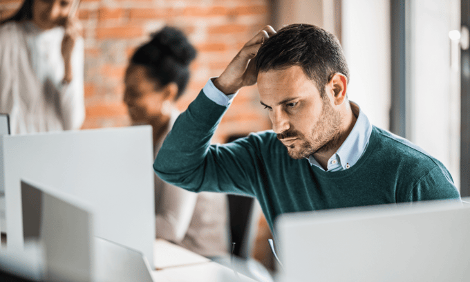 Man stressed about sending email to the wrong person