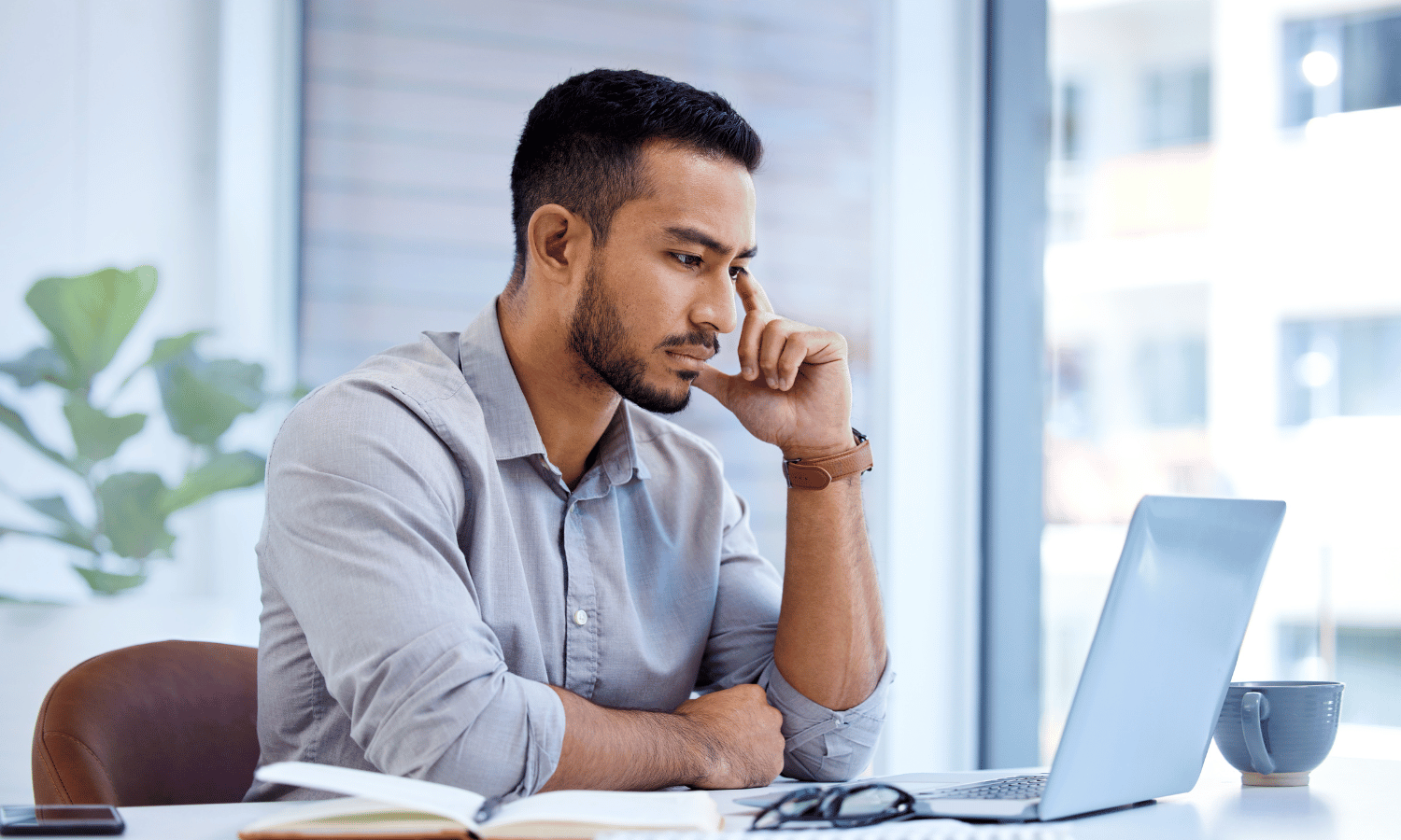 Man stressed about having too many passwords