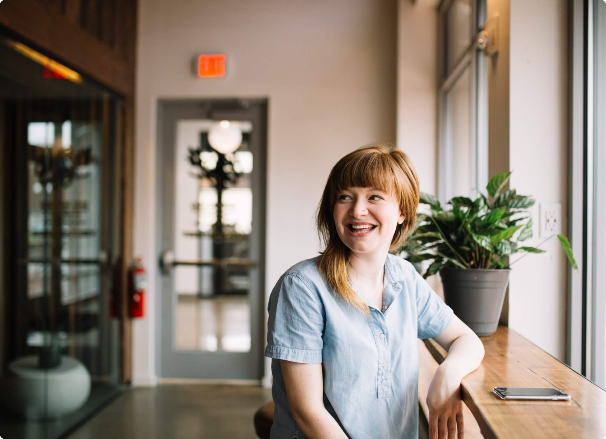 Woman smiling about social efforts