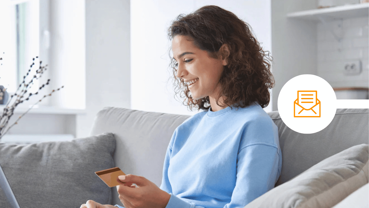 Woman using her card to pay online