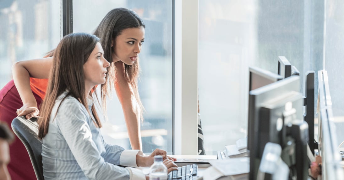 Colleagues looking at secure email together