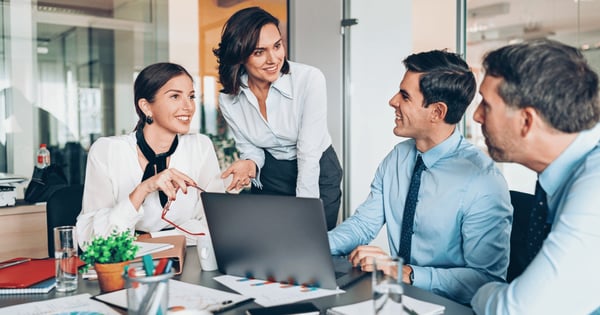 Female leader meeting with financial services colleagues