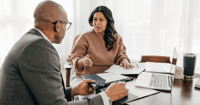 Financial adviser telling client about portal