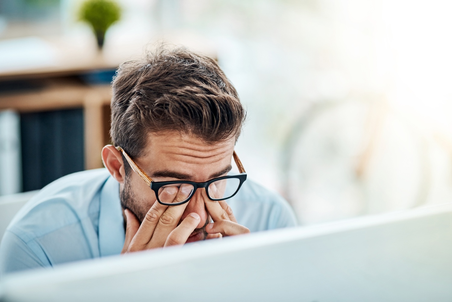 Man stressed out over cybersecurity