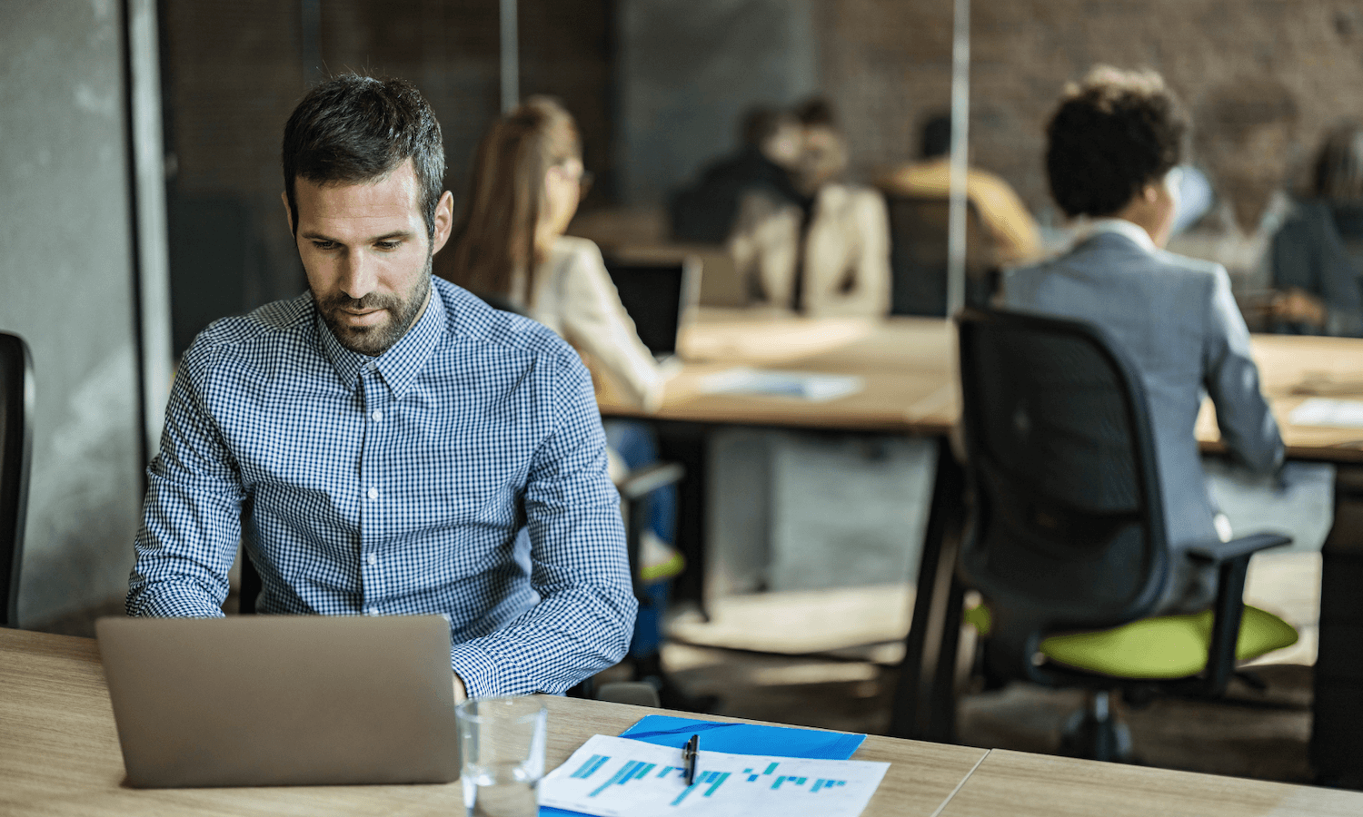 man concentrating on security settings for company admin