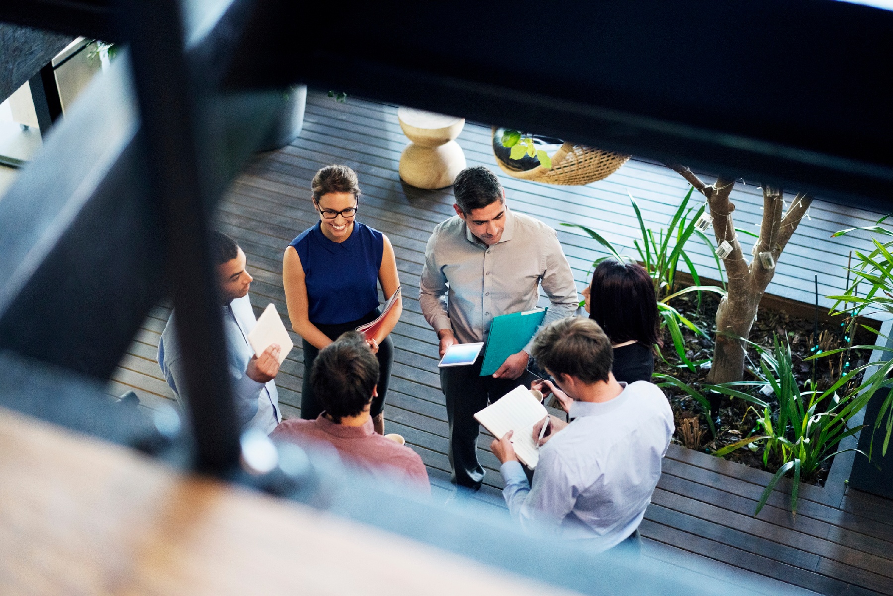 marketing team in meeting discussing reputational benefits of secure email