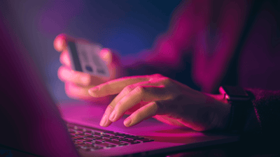 using computer to type in staff security code (1)