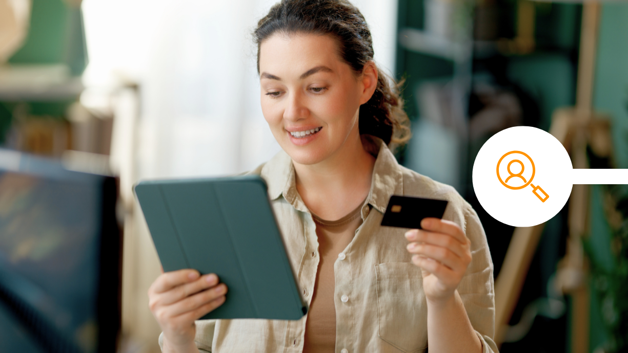 Woman using her credit card online
