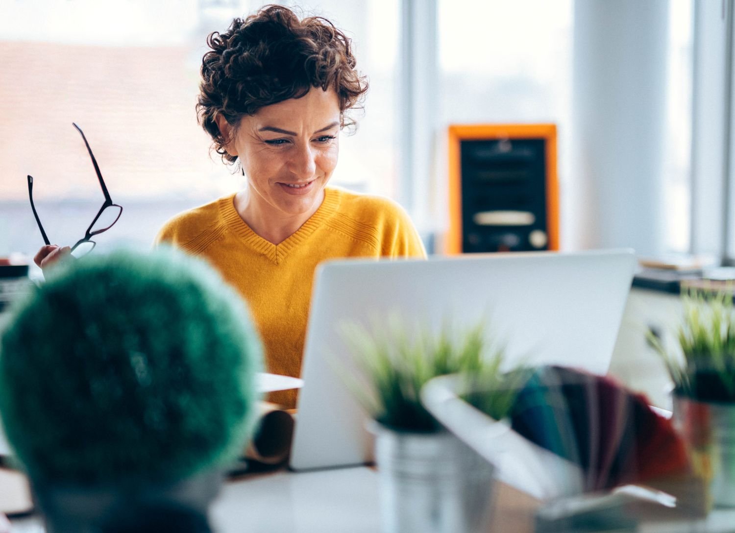 woman reading secure email challenge on her laptop