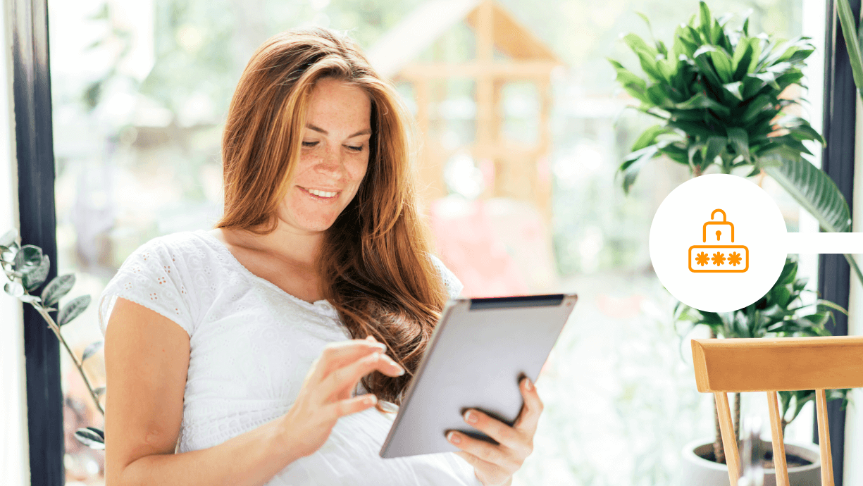 woman signing document using tablet