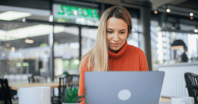 woman using laptop in her office