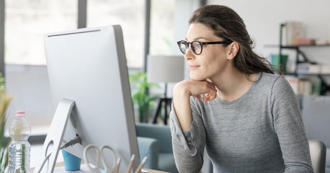 woman using secure email gateway to secure emails in office