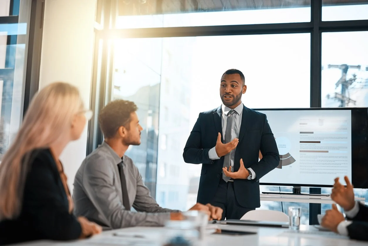 business-consultant-presenting-to-board